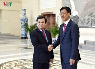 Ông  Lê Minh Trí - Viện trưởng VKSNDTC và ông Tào Kiến Minh- Viện trưởng Viện VKSNDTC Trung Quốc