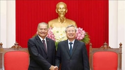 Thường trực Ban Bí thư tiếp Đoàn đại biểu Đảng Nhân dân Cách mạng Lào